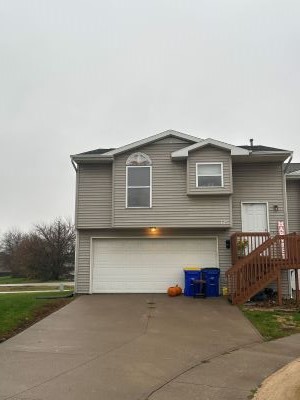 Front view of home with driveway